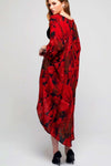 Model wearing long black crepe kimono with red leaf prints facing back